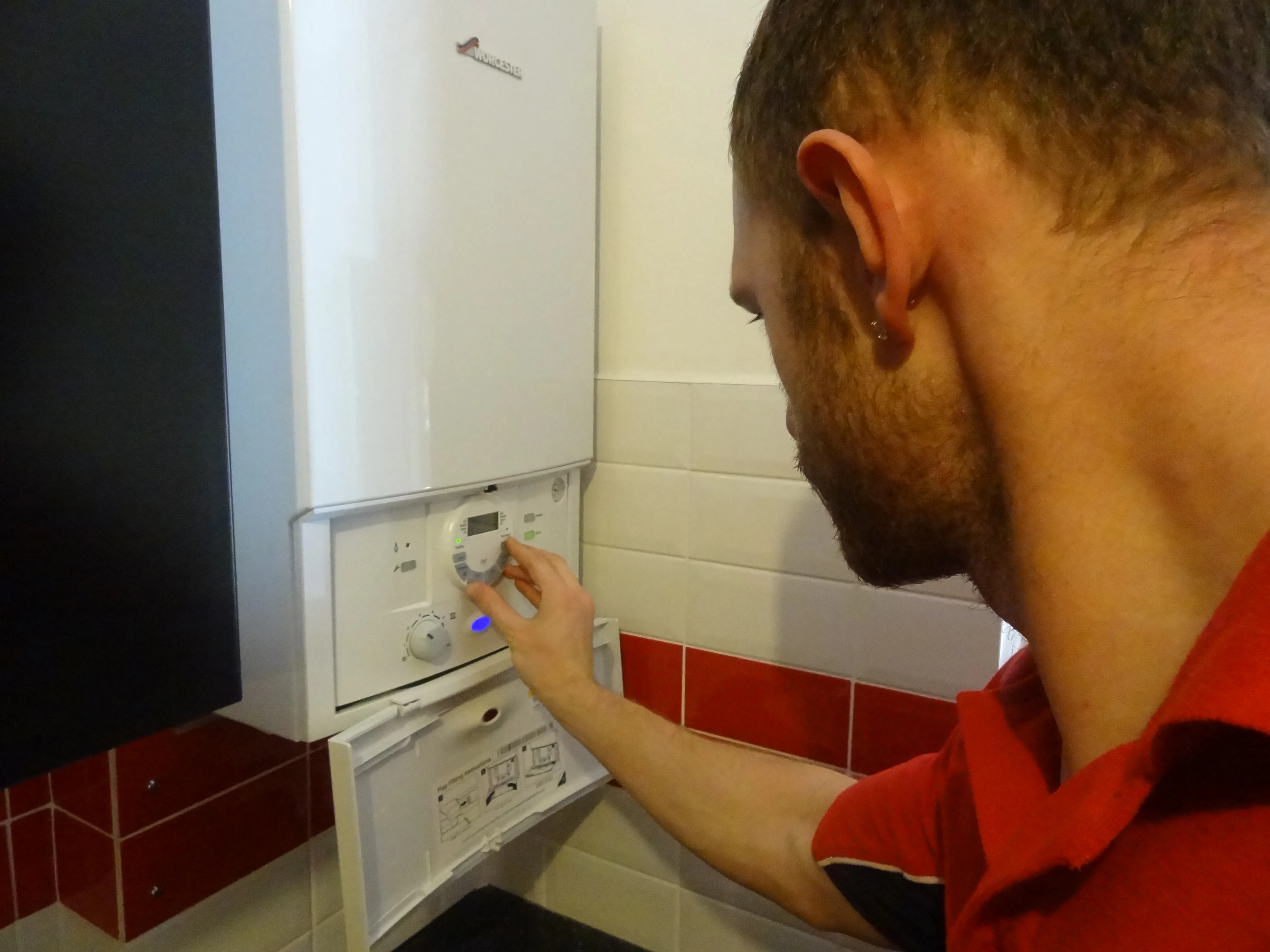Chelsea Plumbers 247 engineer working on a boiler installation in Chelsea